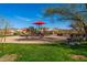 Community playground with play structures for  at 18422 E Verde Ct, Gold Canyon, AZ 85118