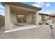 Backyard patio with lounge chairs and view at 20416 W Calle Encorvada Ln, Buckeye, AZ 85396