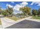 Community tennis courts with playground in view at 2528 N Petersburg Dr, Florence, AZ 85132