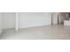 Bright living room features tile flooring and neutral paint at 25425 W Graham Trl, Buckeye, AZ 85326