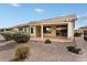 Covered patio with pergola, desert landscaping, and a spacious layout at 26180 W Firehawk Dr, Buckeye, AZ 85396