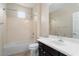 Clean bathroom with a tub, toilet, sink, and vanity at 26180 W Firehawk Dr, Buckeye, AZ 85396