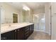 Double vanity bathroom with a large shower at 26180 W Firehawk Dr, Buckeye, AZ 85396