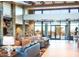 Elegant community clubhouse lobby with comfortable seating at 26180 W Firehawk Dr, Buckeye, AZ 85396