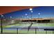 Well-lit pickleball courts perfect for evening games at 26180 W Firehawk Dr, Buckeye, AZ 85396