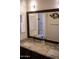 Bathroom boasts double sinks and granite countertops at 3410 N 131St Ln, Litchfield Park, AZ 85340