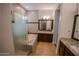 Elegant bathroom with soaking tub, walk-in shower, and dual vanities at 3410 N 131St Ln, Litchfield Park, AZ 85340