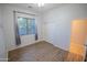 Spacious bedroom with wood-look floors and window coverings at 3410 N 131St Ln, Litchfield Park, AZ 85340