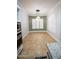 Bright dining room with tiled floors and plenty of natural light at 3410 N 131St Ln, Litchfield Park, AZ 85340
