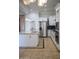 Spacious kitchen featuring granite countertops and stainless steel appliances at 3410 N 131St Ln, Litchfield Park, AZ 85340