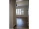 Open living area with wood-look flooring at 3410 N 131St Ln, Litchfield Park, AZ 85340