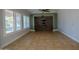 Spacious living room with stone accent wall and ceiling fan at 3410 N 131St Ln, Litchfield Park, AZ 85340
