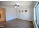 Bright living room featuring hardwood floors and ceiling fan at 3410 N 131St Ln, Litchfield Park, AZ 85340