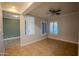 Light and airy living room with tile floors at 3410 N 131St Ln, Litchfield Park, AZ 85340