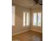 Spacious living room with tile flooring and lots of natural light at 3410 N 131St Ln, Litchfield Park, AZ 85340