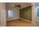 Bright home office with plantation shutters and tiled floors at 3410 N 131St Ln, Litchfield Park, AZ 85340