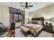 Serene bedroom with a large bed and mountain views at 38450 N 95Th Way, Scottsdale, AZ 85262