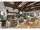 Bright and airy living room with multiple seating areas and access to patio at 38450 N 95Th Way, Scottsdale, AZ 85262