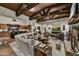 Spacious living room with high ceilings, stone fireplace, and ample seating at 38450 N 95Th Way, Scottsdale, AZ 85262
