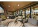 Relaxing stone patio with seating area and fireplace at 38450 N 95Th Way, Scottsdale, AZ 85262