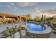 Relaxing pool area with a spa and waterfall feature at 38450 N 95Th Way, Scottsdale, AZ 85262