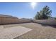 Sunny backyard, featuring gravel and a brick patio area at 4320 S Rim Ct, Gilbert, AZ 85297