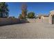 Large backyard with gravel and patio area at 4320 S Rim Ct, Gilbert, AZ 85297