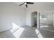 Spacious bedroom with mirrored closet doors and en-suite bathroom at 4320 S Rim Ct, Gilbert, AZ 85297