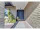 Front entrance with decorative metal doors and brick facade at 4738 W Vogel Ave, Glendale, AZ 85302