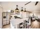 Modern kitchen with stainless steel appliances and a large island at 4950 N Miller Rd # 210, Scottsdale, AZ 85251