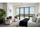 Spacious bedroom with stunning mountain views and sitting area at 5939 E Quartz Mountain Rd, Paradise Valley, AZ 85253