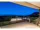 Rooftop deck with panoramic mountain views at night at 5939 E Quartz Mountain Rd, Paradise Valley, AZ 85253