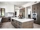 Gourmet kitchen boasts marble countertops and top-of-the-line appliances at 5939 E Quartz Mountain Rd, Paradise Valley, AZ 85253