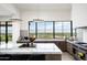 Modern kitchen with expansive windows and mountain views at 5939 E Quartz Mountain Rd, Paradise Valley, AZ 85253
