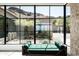 Relaxing sitting area with mountain views and a green couch at 5939 E Quartz Mountain Rd, Paradise Valley, AZ 85253