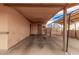 Covered carport area adjacent to the house at 74 S 94Th Pl, Chandler, AZ 85224