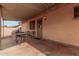 Covered patio with seating area, adjacent to house at 74 S 94Th Pl, Chandler, AZ 85224