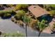 Aerial view of single-story home with landscaped yard and driveway at 7830 E Carefree Estates Cir, Carefree, AZ 85377