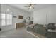 Well-lit bedroom featuring a full-size bed and built-in storage at 8500 E Aster Dr, Scottsdale, AZ 85260