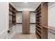 Large walk-in closet with ample shelving and hanging space at 8500 E Aster Dr, Scottsdale, AZ 85260