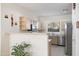 Well-equipped kitchen with light wood cabinets and stainless steel appliances at 9846 E Stone Circle Ln, Gold Canyon, AZ 85118