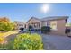 Spacious backyard with patio and mature landscaping at 16140 W Almeria Rd, Goodyear, AZ 85395