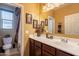 Clean bathroom with a large vanity and updated fixtures at 16140 W Almeria Rd, Goodyear, AZ 85395