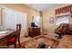 Spacious bedroom with a desk and chair, perfect for working from home at 16140 W Almeria Rd, Goodyear, AZ 85395