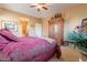 Large bedroom with a queen bed and ample closet space at 16140 W Almeria Rd, Goodyear, AZ 85395
