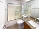 Clean bathroom with granite vanity, shower/tub combo, and a large mirror at 16530 N 114Th Dr, Surprise, AZ 85378