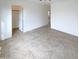 Spacious bedroom with tile floors and a large closet at 16530 N 114Th Dr, Surprise, AZ 85378