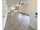 Spacious entryway with tile flooring and a view into the living area at 16530 N 114Th Dr, Surprise, AZ 85378
