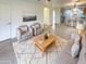 Bright and airy living room with a neutral color palette and comfortable seating at 16530 N 114Th Dr, Surprise, AZ 85378