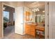 Bathroom with vanity, tiled flooring, and access to the bedroom at 22719 N 93Rd St, Scottsdale, AZ 85255